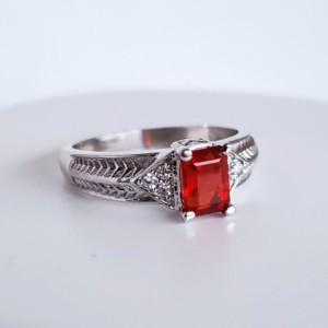 Mexican Fire Opal set in 14KT White Gold with round Diamonds